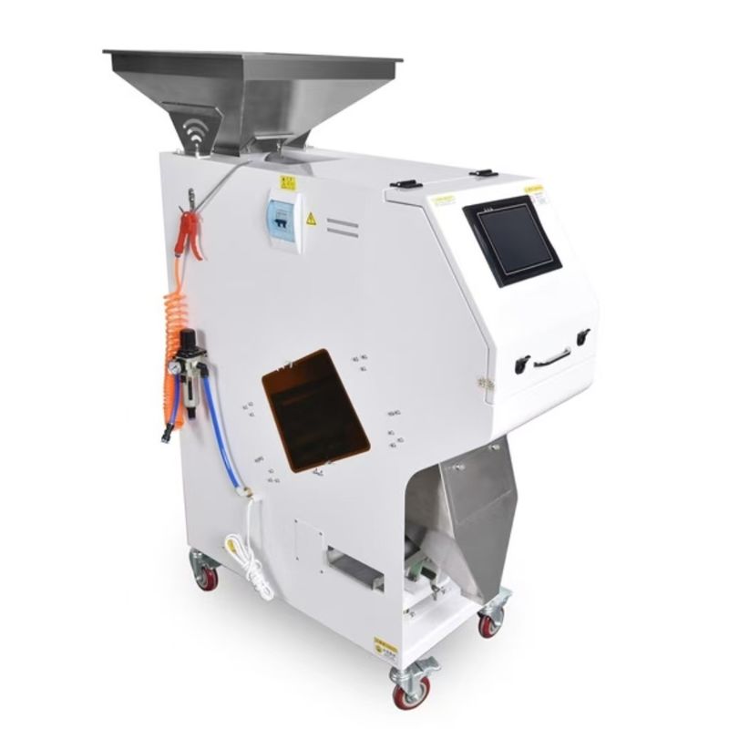 300 à 400 kg par heure Petit parachute de type 32 canaux Caméra haute résolution CCD Sorteur de couleurs